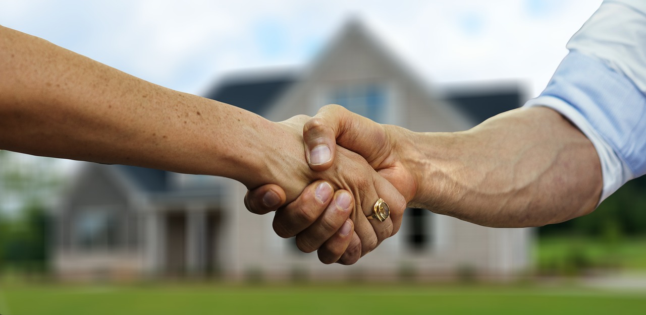Handshake on home deal
